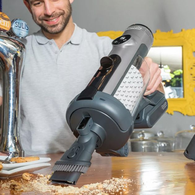 Aspirateur balai sans fil Henry Quick Numatic Gris à main