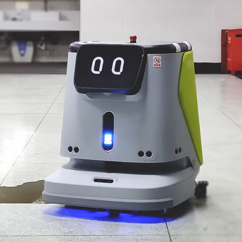 Robot laveur de sol professionnel PUDU CC1 ambiance blanc