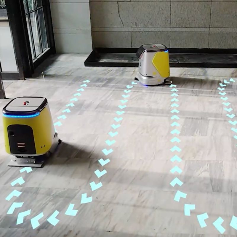 Robot laveur de sol professionnel PUDU CC1 ambiance du blanc 