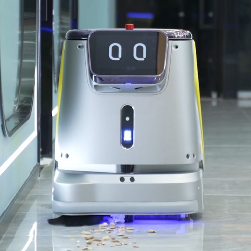 Robot laveur de sol professionnel PUDU CC1 ambiance gris face