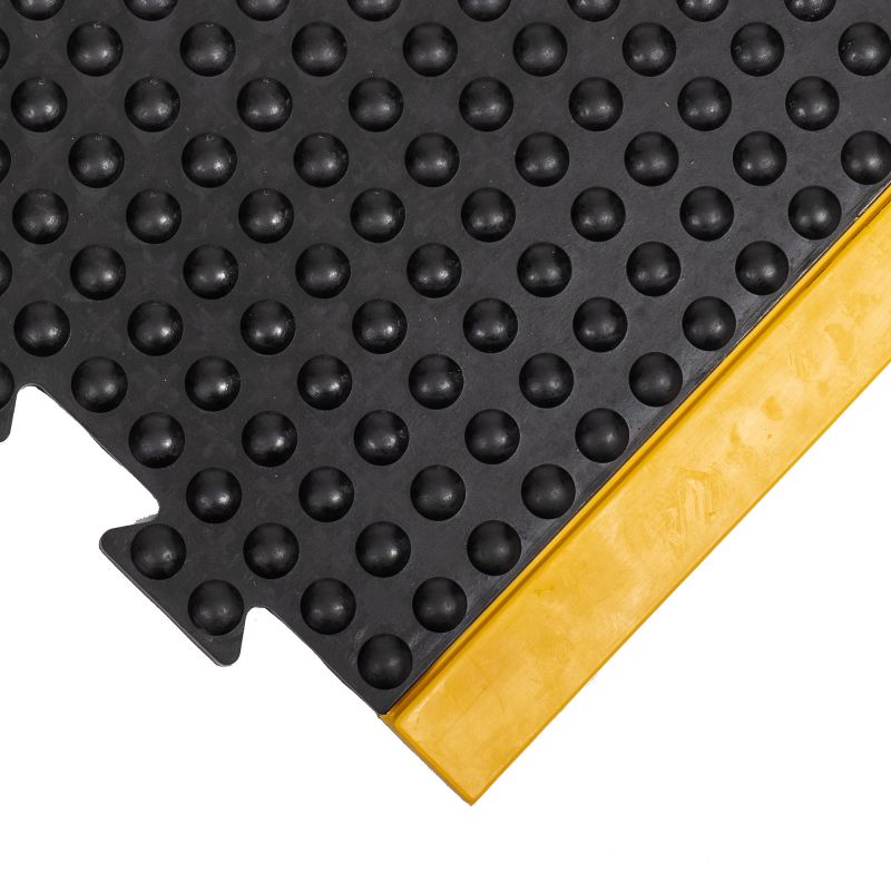 Dalle à bord jaune emboitable zoom matière